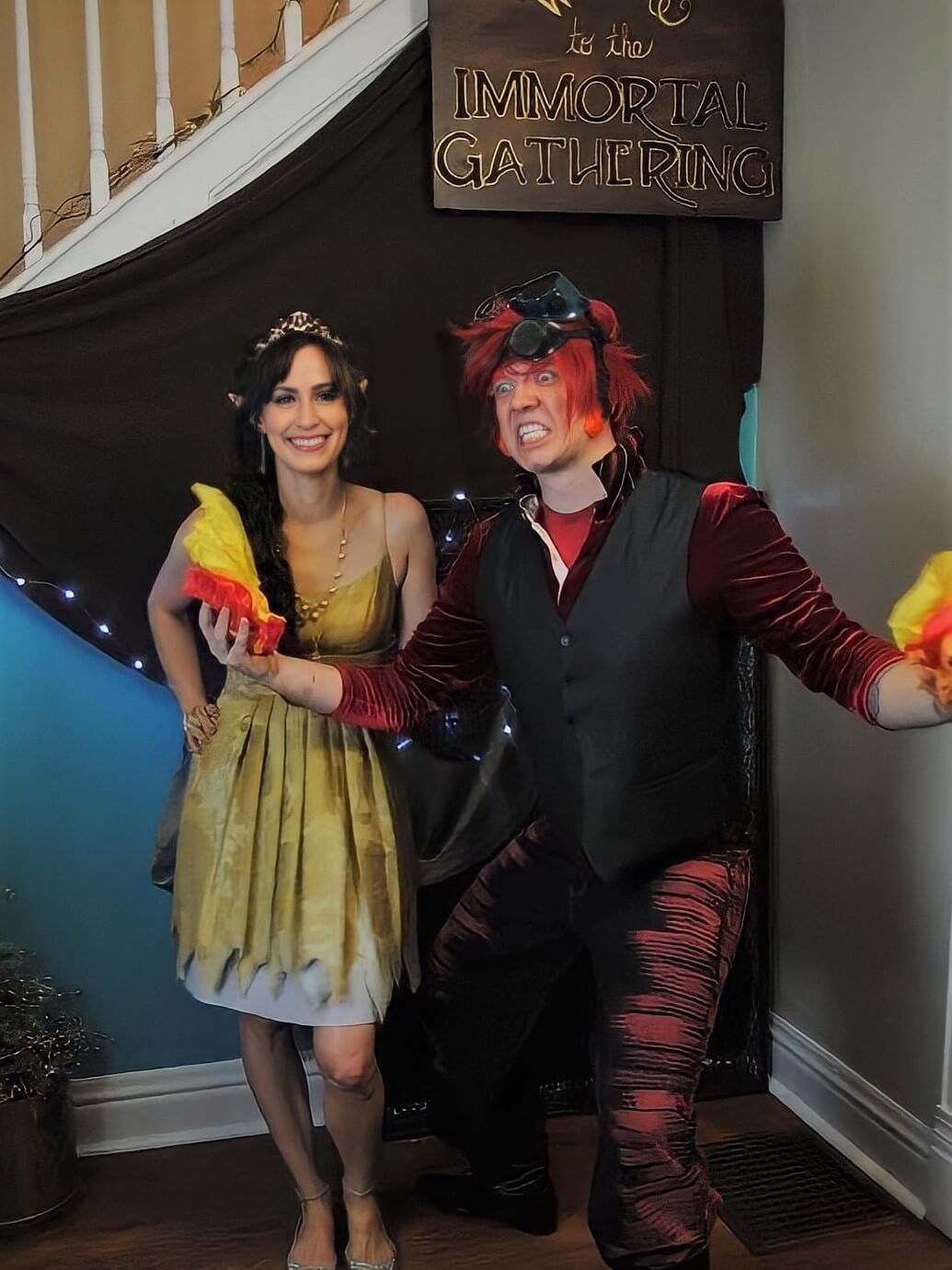 amy in a fairy costume and gabe in a fire elf costume