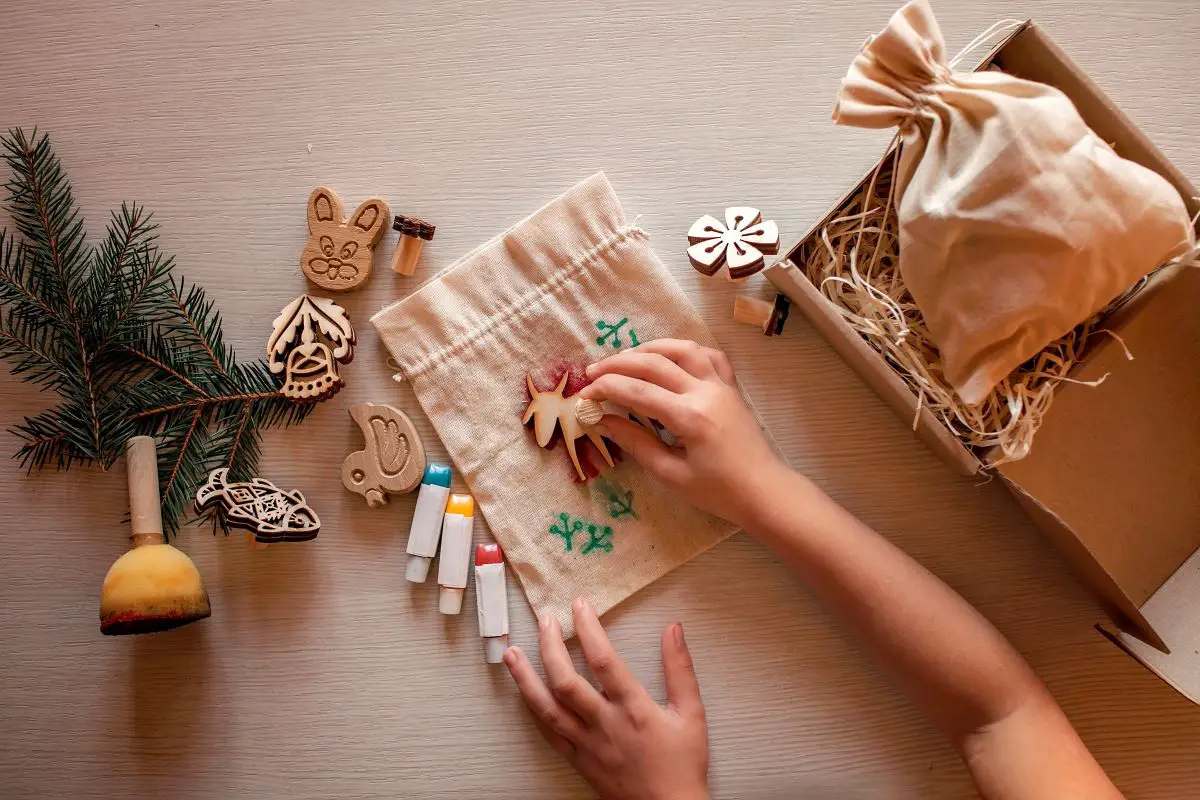 A handmade gift bag with stamps.