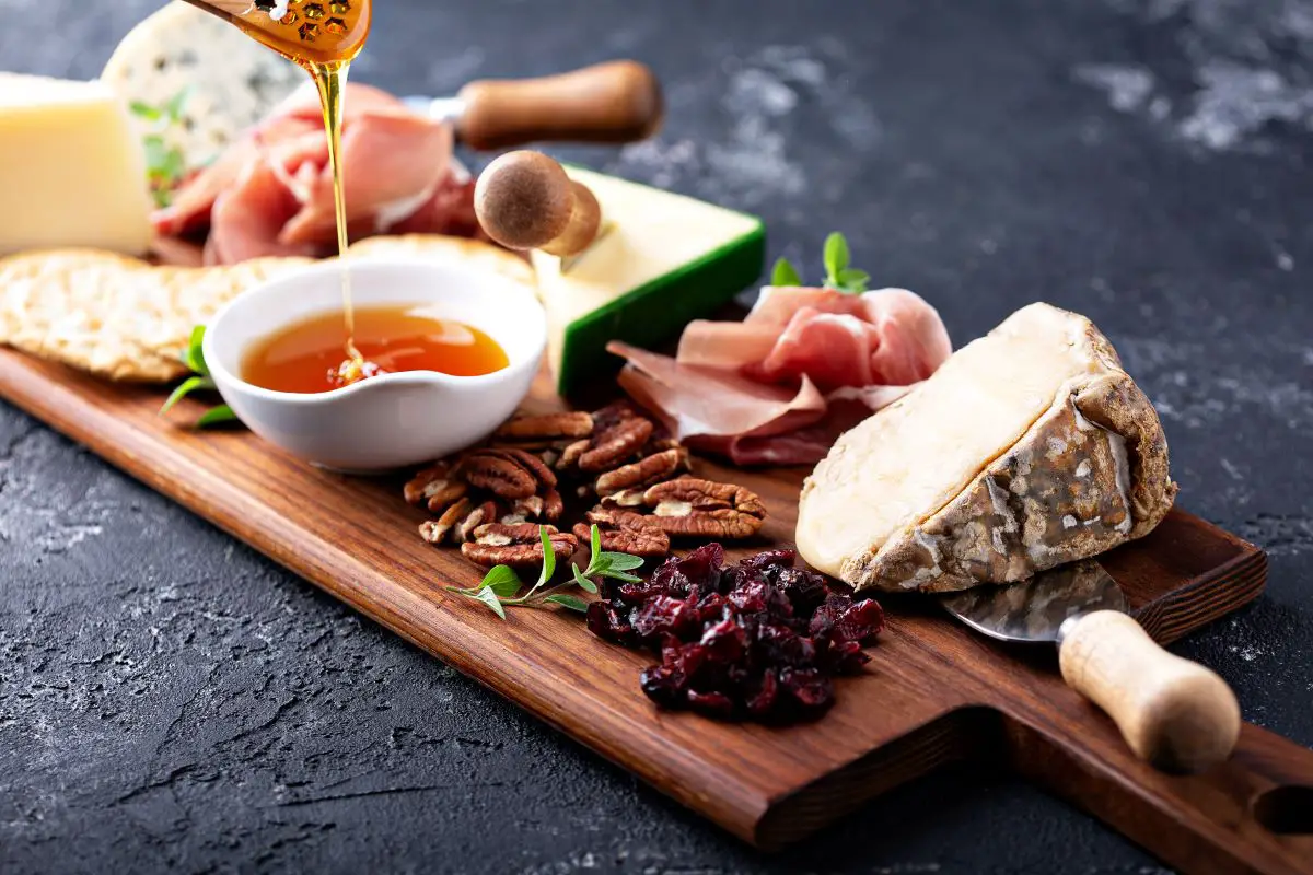 A French cheese and fruit board.